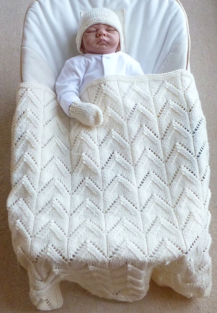 Arches lace baby blanket, hat and mittens newborn gift set free knitting patterns by LJM Designs
