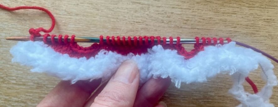 Cast off stitches in row 7 to make the armholes