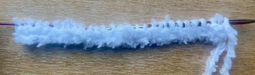 Fluffy neck knit with 2 rows of garter stitch