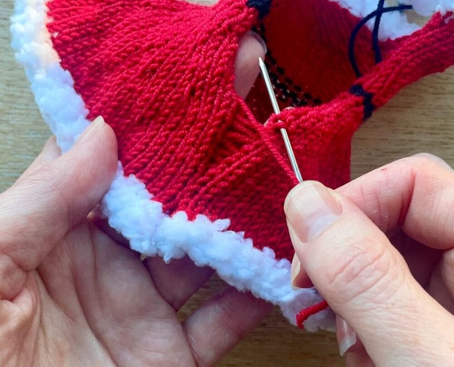 Seam the back of the dress using mattress stitch for a neat finish