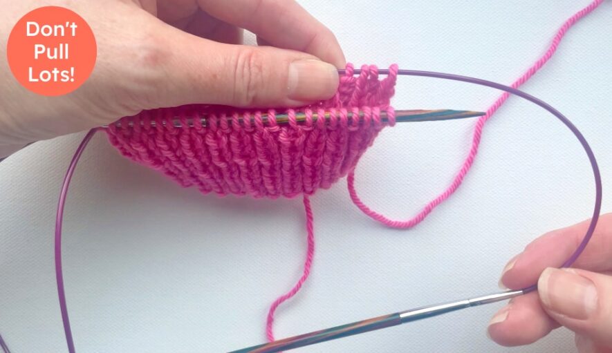 Slide back tip out a bit gently, don't pull lots out like standard magic loop