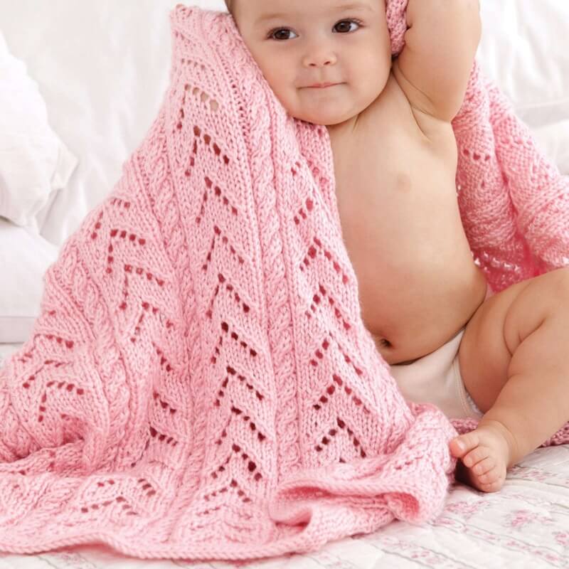 Caron little girl cables & lace baby blanket free knitting pattern