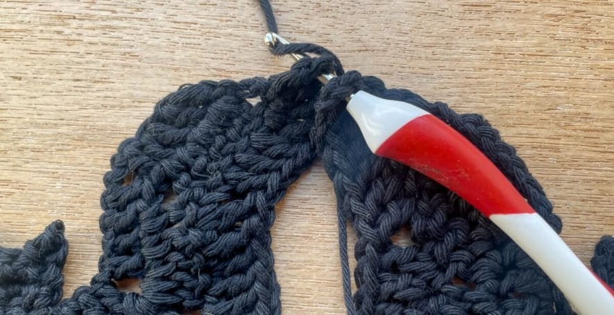 Join 2 bats with crochet by putting your hook through the left corner of 1 and the right corner of the other & pulling a loop of yarn through
