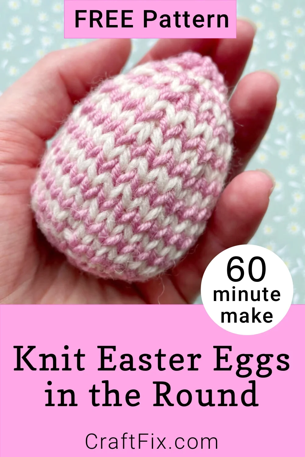 Close up of hand holding striped easter egg decoration knit in the round in 60 minutes with this free pattern