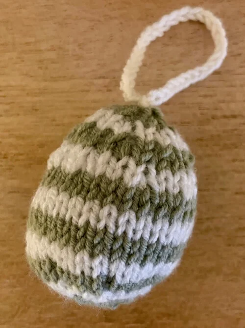 flat knit striped easter egg with crochet hanging loop attached