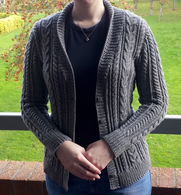 Handknit cardigan with all over cables design