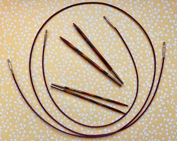 Interchangeable circular needles have separate needle tips and cables