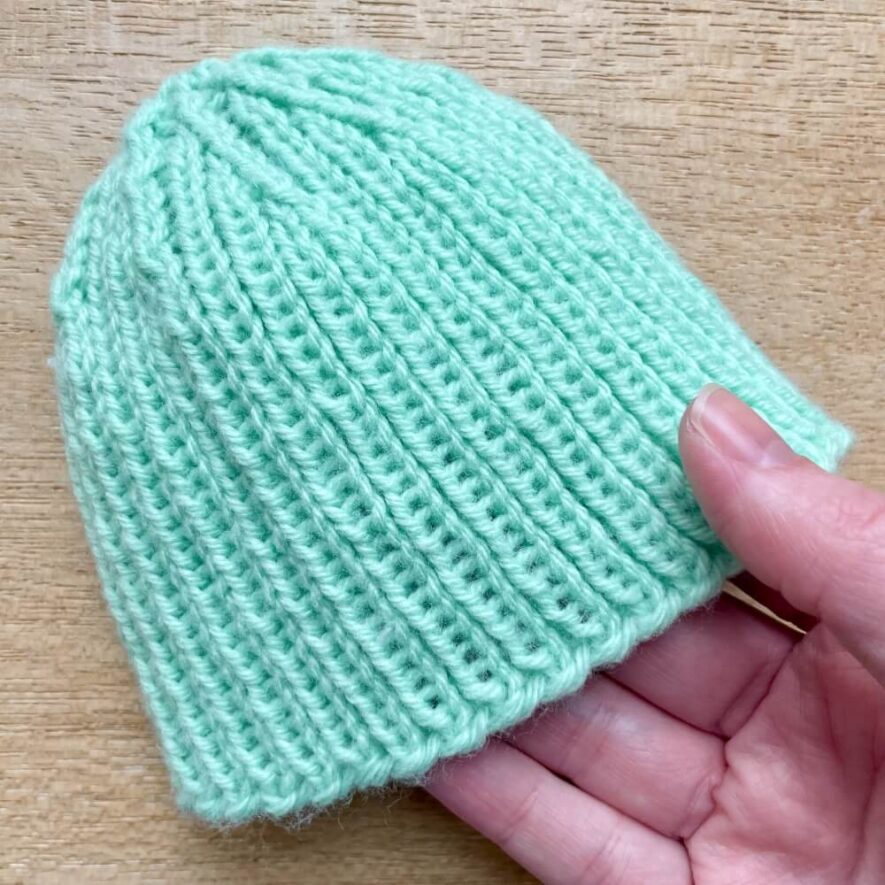 Newborn ribbed hat (size 1) knit with Sirdar Snuggly DK