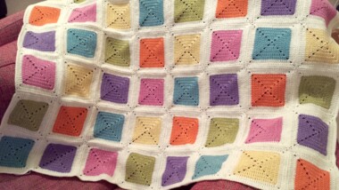 Rainbow granny square blanket
