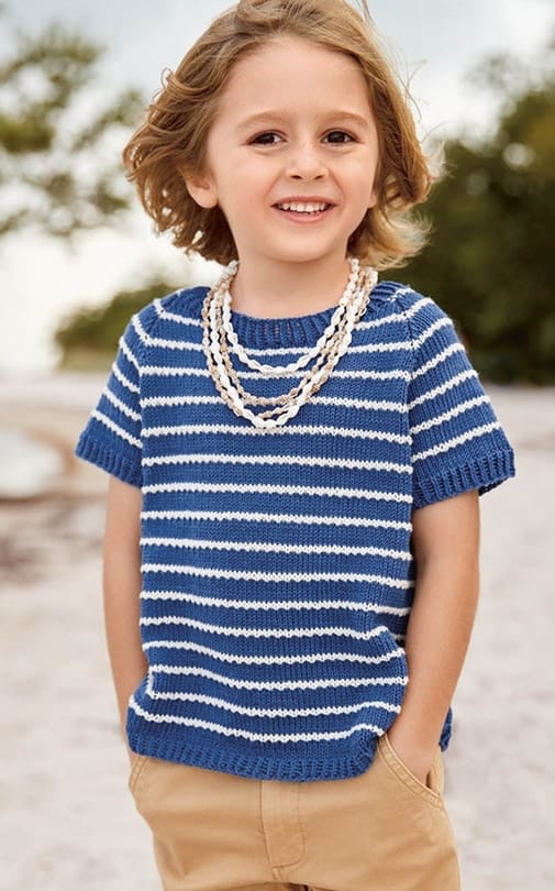 Child wearing Sandnes Garn free striped t-shirt knitting pattern