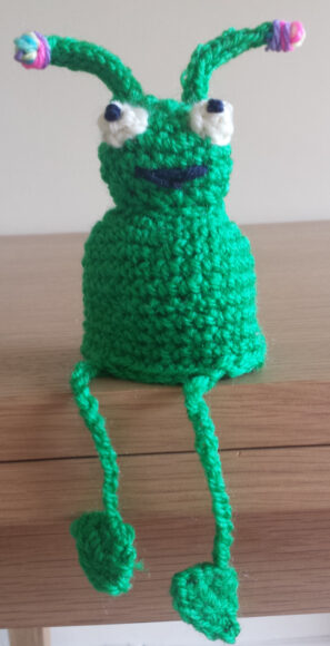 My Big Knit alien hat using the Oliver Boliver crochet frog hat pattern with added knit icord antennae
