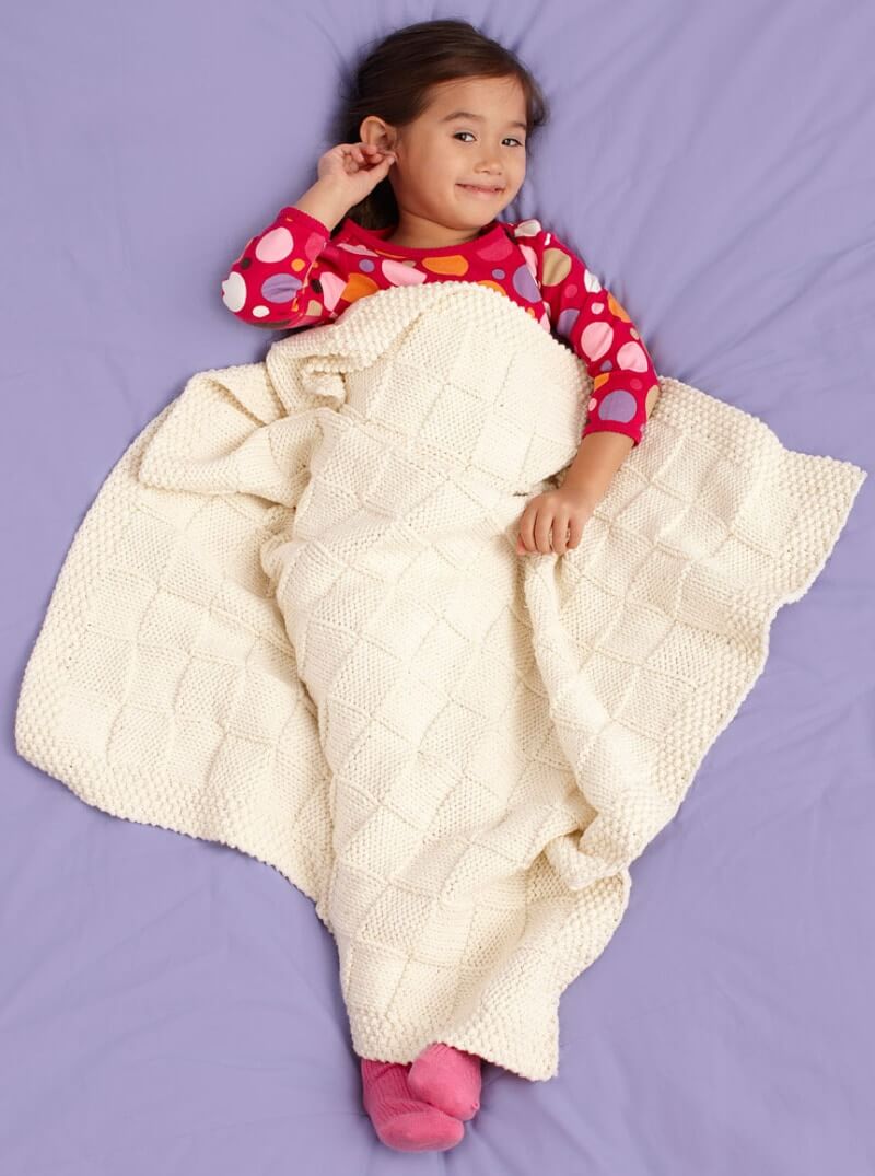 Tic Tac Toe blankie free knitting pattern from Lion Brand
